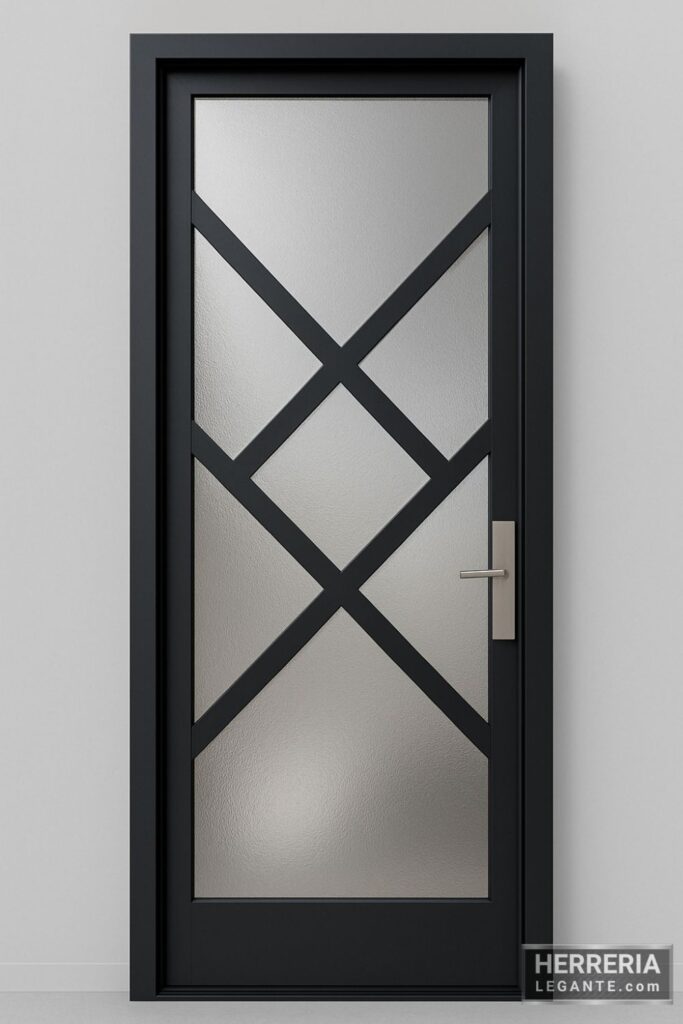 puerta de herrería negra con diseño geométrico en cruz y vidrio esmerilado, vista frontal sobre fondo gris claro